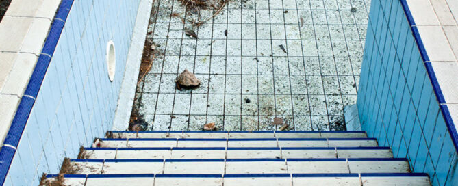 from dive to demolition: understanding how the swimming pool demolition process works